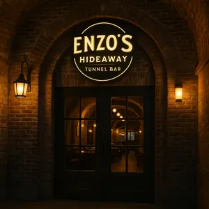 A restaurant with tables and booths set for dining