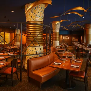 View from rear of dining room, showing hanging yellow bird sculptures
