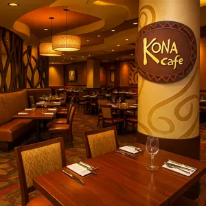 Dining hall with Polynesian inspired architecture including a ceiling mural and natural wood accents