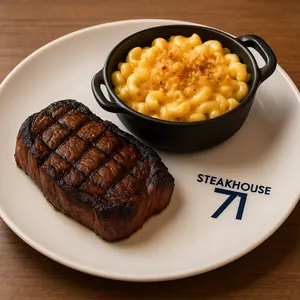Pork chops served with mustard butter and a side dish