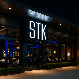 An assortment of food including steak, hamburgers, seafood and sides at S T K Orlando