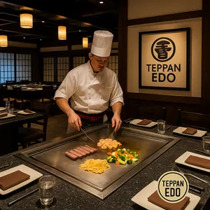 Rosewood tables, rice-paper light fixtures and an image of Mt. Fuji embellish this restaurant’s interior